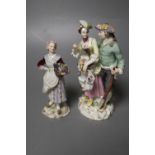 A Meissen group of a gardener and companion and a Meissen figure of a fruit seller, tallest 15cm (