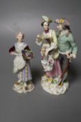 A Meissen group of a gardener and companion and a Meissen figure of a fruit seller, tallest 15cm (