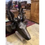 A large carved pine moose head sculpture, height 132cm