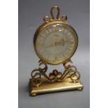 An Imhof vintage gilt brass small mantel clock, having circular Roman dial on scrolled supports