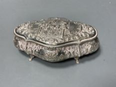 A late 19th century Dutch embossed white metal ovoid trinket box, on four paw feet, 15.2cm, 7oz.