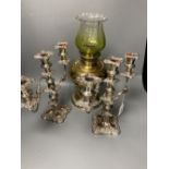 A pair of plated two branch candelabra and a brass oil lamp (3)