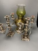 A pair of plated two branch candelabra and a brass oil lamp (3)