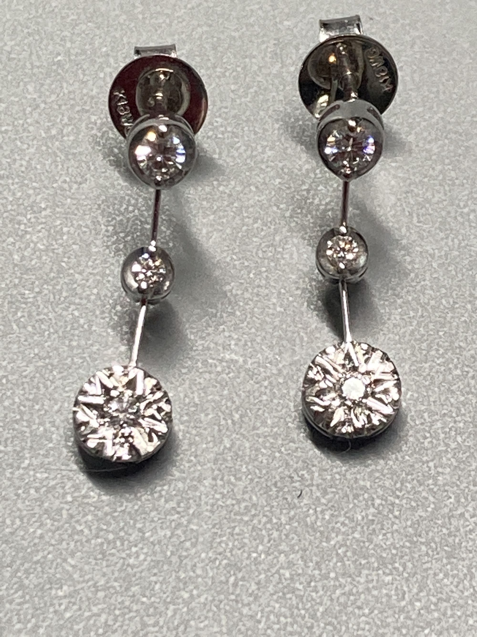 A modern pair of 18ct white gold and illusion set three stone diamond drop earrings, 19mm, gross 2.3 - Image 2 of 3