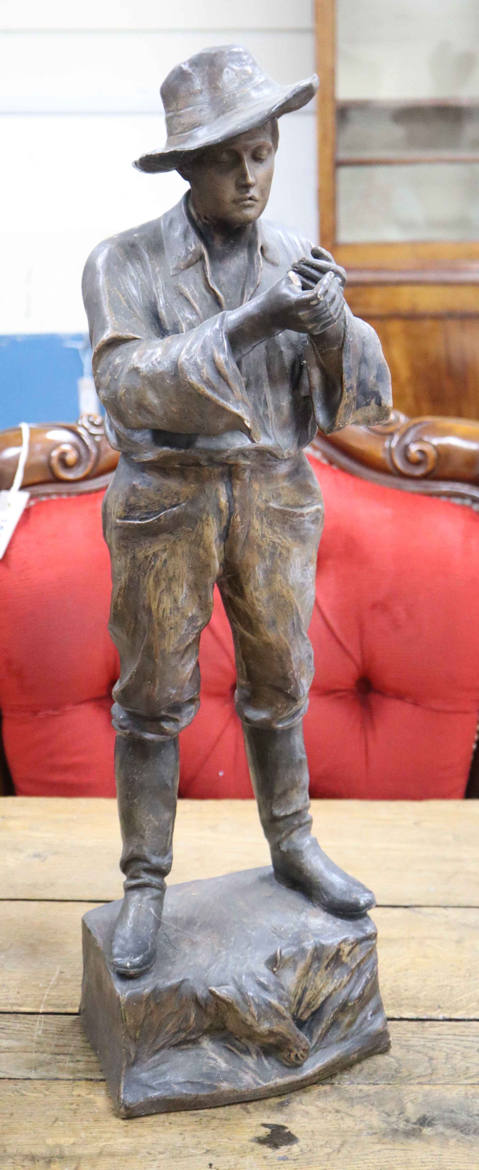 A large Goldscheider cold painted pottery figure of a cowboy, height 67cm formerly mounted as a