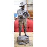 A large Goldscheider cold painted pottery figure of a cowboy, height 67cm formerly mounted as a