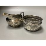 A George III embossed silver cream jug, Emes & Barnard, London, 1812 and a later silver sugar