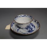 A Chinese Kangxi blue and white 'leaping carp' tea bowl and saucer, 13cm diameter