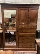 An Edwardian walnut wardrobe, width 161cm depth 56cm height 209cm