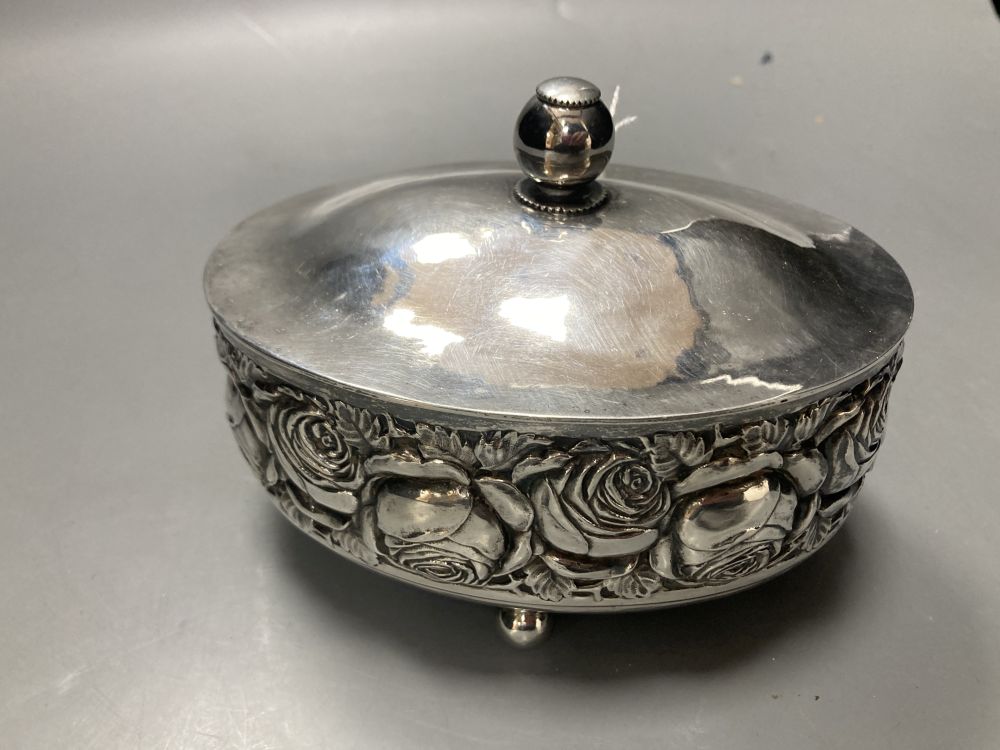 An early to mid 20th century continental 800 standard white metal oval lidded box, embossed with