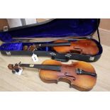 A Czech 3/4 size violin and a German 3/4 size violin, length of backs both 34cm