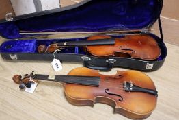 A Czech 3/4 size violin and a German 3/4 size violin, length of backs both 34cm