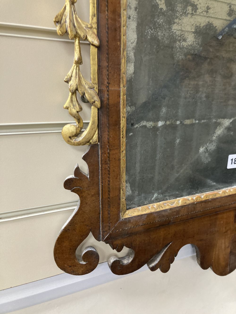 A George II parcel gilt walnut fret cut wall mirror, width 56cm height 120cm - Image 3 of 4
