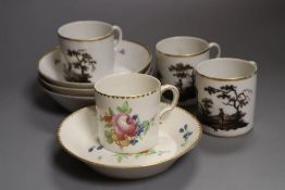 A Frankenthal coffee can and saucer painted with a large rose and other flowers and three Paris