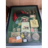 Horse racing memorabilia, arranged and contained in a glazed case, over height 56cm width 46cm