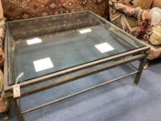 A contemporary aged metal square glass top glass coffee table, width 116cm height 47cm