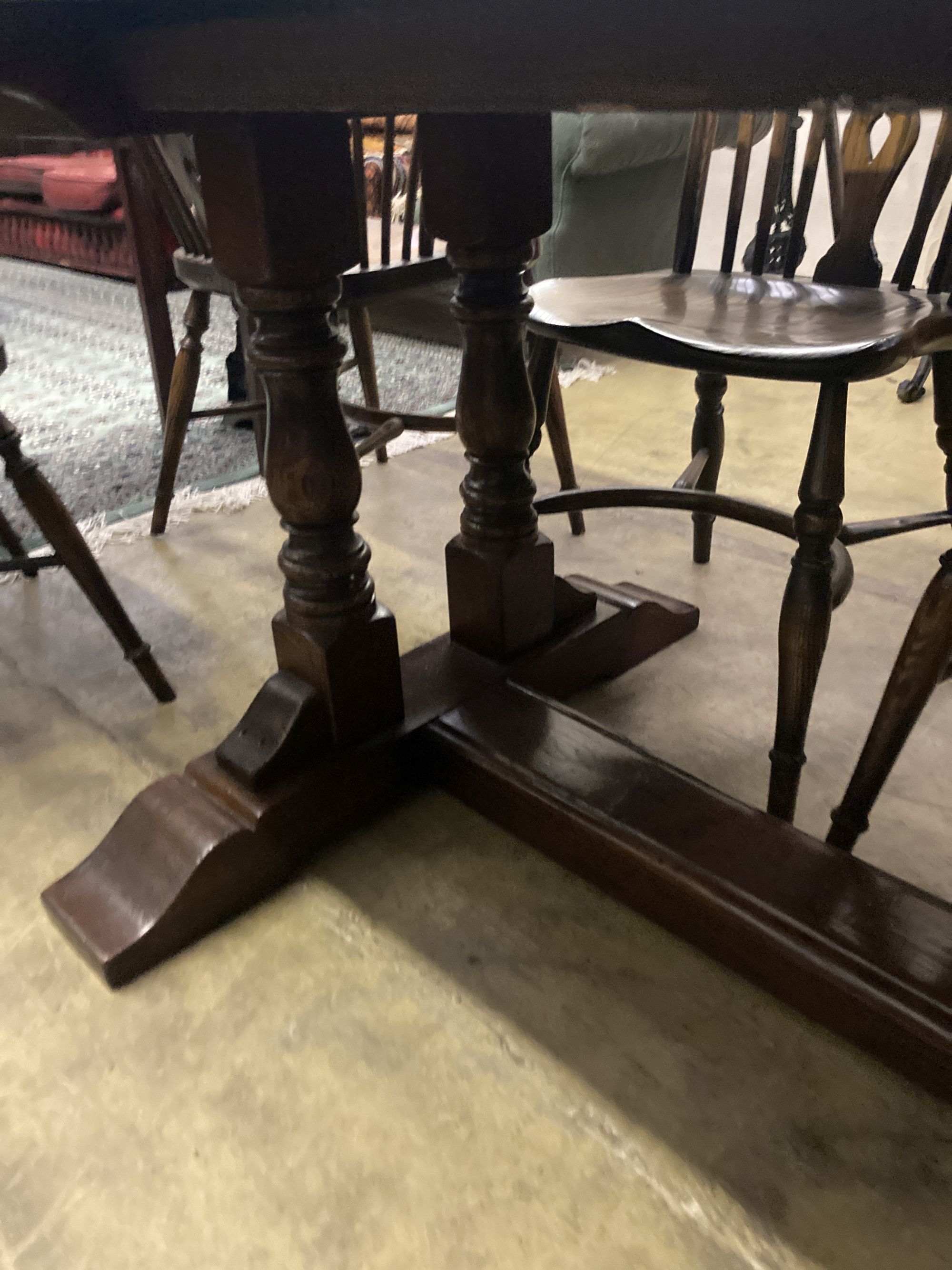 An 18th century style oak refectory table having planked top on double turned end supports, width - Image 5 of 5