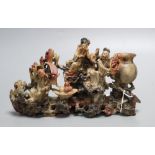 A Chinese soapstone carving of immortals, early 20th century, length 21cmCONDITION: Provenance -