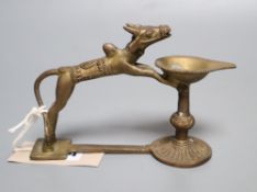 An Indian brass oil lamp