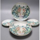 A pair of Chinese enamelled porcelain saucer dishes and two similar smaller bearing Daoguang