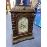 A Victorian oak mantel clock, height 50cm