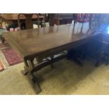 An 18th century style oak draw leaf dining table, width 150cm, depth 75cm, height 77cm