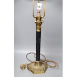 A brass and ebonised 'patented' table lamp