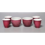 Four Chinese ruby ground tea cups and a pair of similar pots, height 6cm