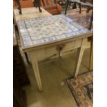 A Continental painted tile top table, width 71cm depth 70cm height 78cm