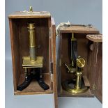 A lacquered brass monocular 'Universal Microscope' by Smith & Beck, London, No. 2911 and another