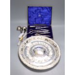 An Eastern embossed plated tray, a cased plated nut and grape set, a plated coffee pot, a silver