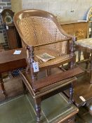 An early Victorian caned mahogany child's high chair on stand, width 42cm, depth 42cm, height 94cm