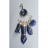 A continental 18k yellow metal and blue banded agate? set charm pendant, gross 25.6 grams, a similar