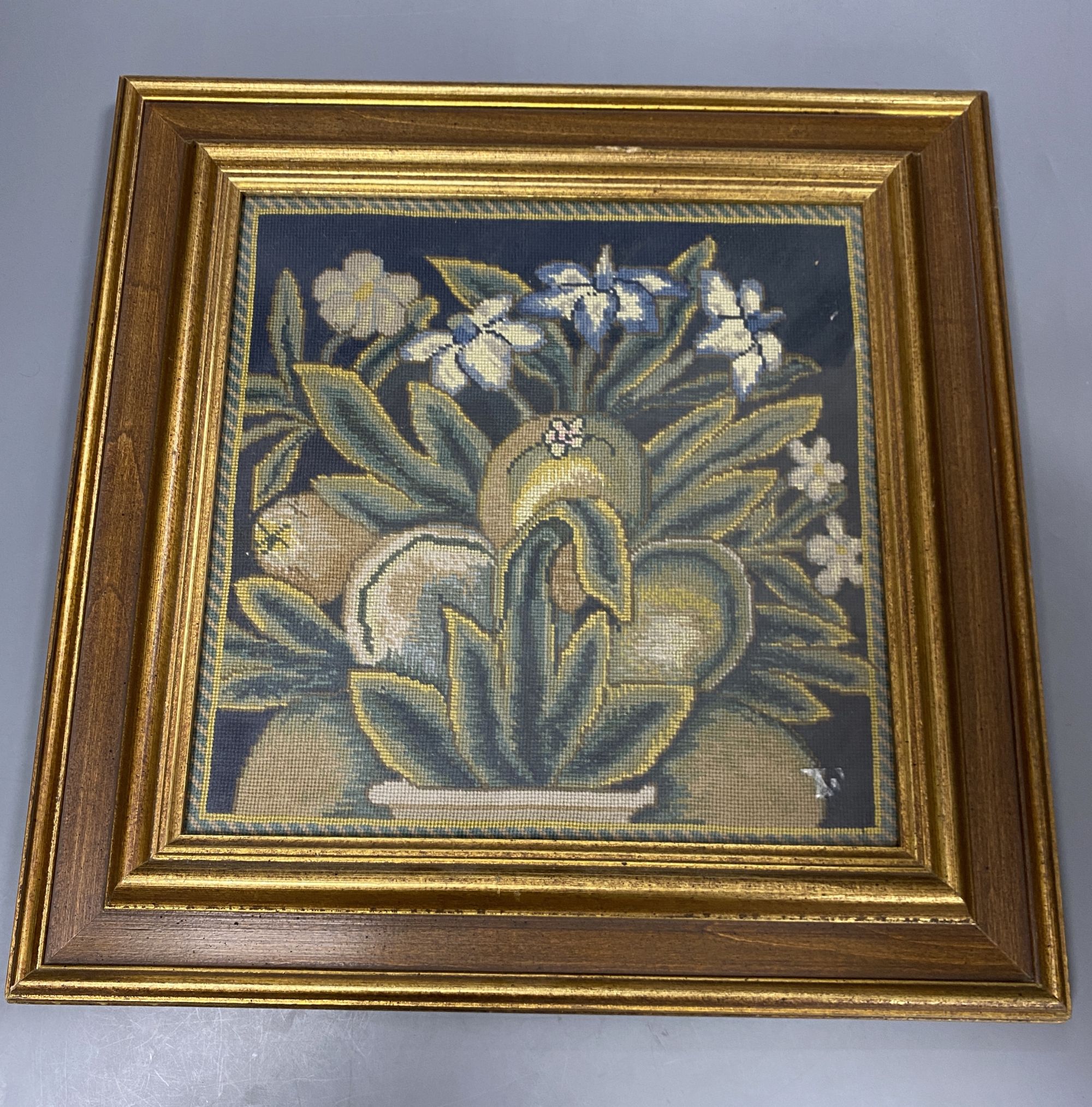 A 19th century petit point floral panel