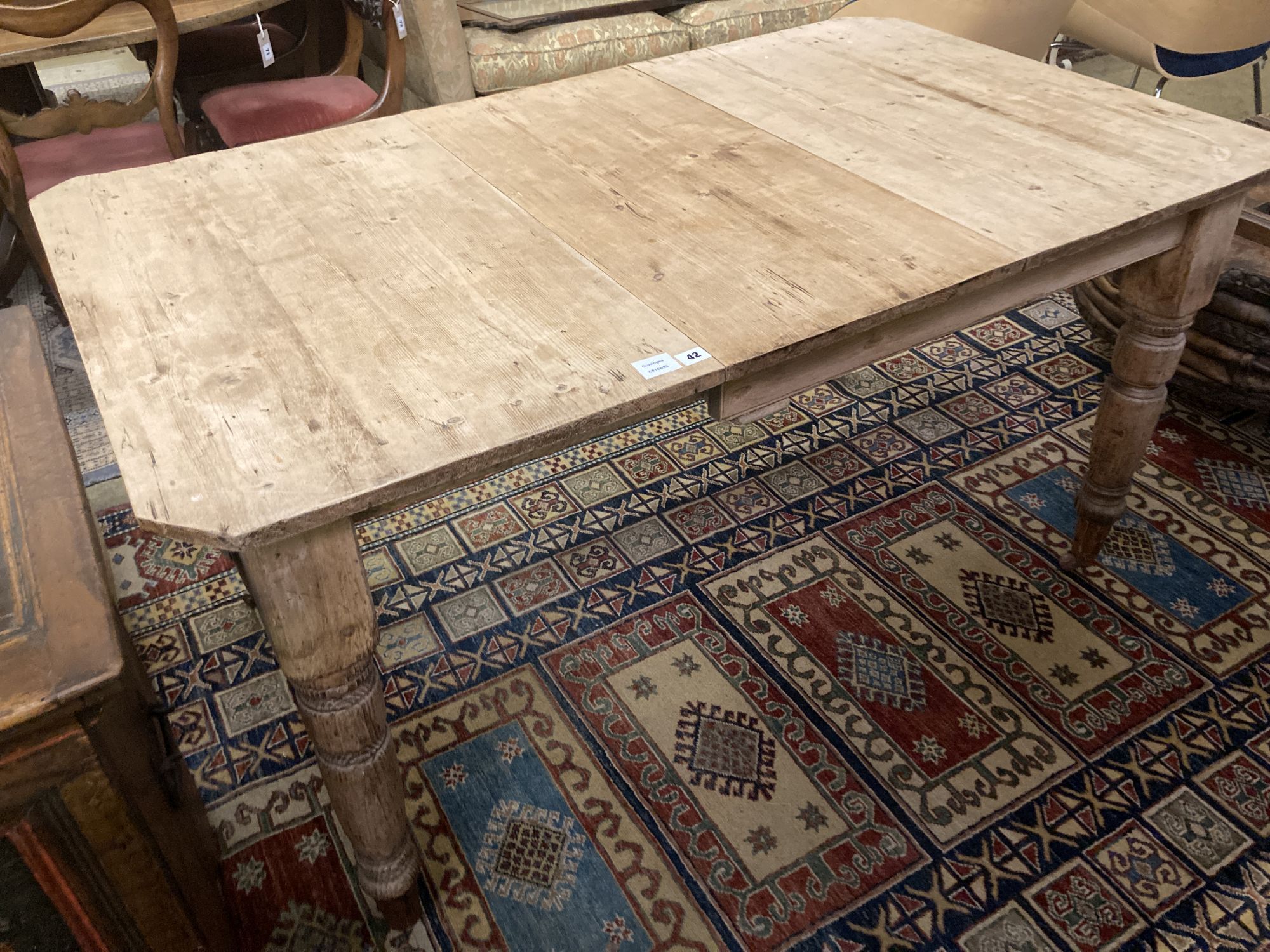 A late Victorian pine extending dining table, 147cm (extended one spare leaf), width 87cm height