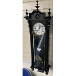 An early 20th century ebonised Vienna wall clock, height 106cm