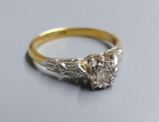 A 1960's 18ct gold and illusion set solitaire diamond ring, size J/K, gross 2.4 grams.