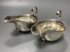 A pair of Edwardian silver sauceboats, Birmingham, 1906, height 8.9cm, 8.5oz.CONDITION: Minor