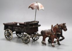 A cast iron model of a horse and carriage, length 37.5cm