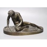 After the Antique. A 19th century bronze figure of the Dying Gaul, length 28cmCONDITION: Small