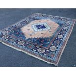 A Persian Shah-Savan carpet, 331 x 268cm