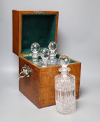 A Victorian oak four decanter box containing two pairs of cut glass decanters, overall height