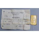 A Swiss Argor S.A. Chiasso '1000' yellow metal ingot, numbered 4577, weighing 50 grams, wit original