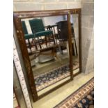A pair of floral rectangular mahogany wall mirrors with painted decoration, width 99cm, height