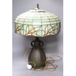 A spelter lamp with Tiffany style shade