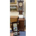 A 19th century American simulated rosewood wall clock, height 84cm, a 19th century inlaid wall clock