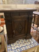 An Italian walnut cupboard, width 68cm depth 32cm height 73cm