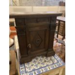 An Italian walnut cupboard, width 68cm depth 32cm height 73cm