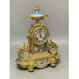 A Louis XVI ormolu mantel clock inset Sevres style panels, height 38cm