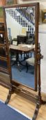 A 1920's oak cheval mirror, width 68cm height 164cm